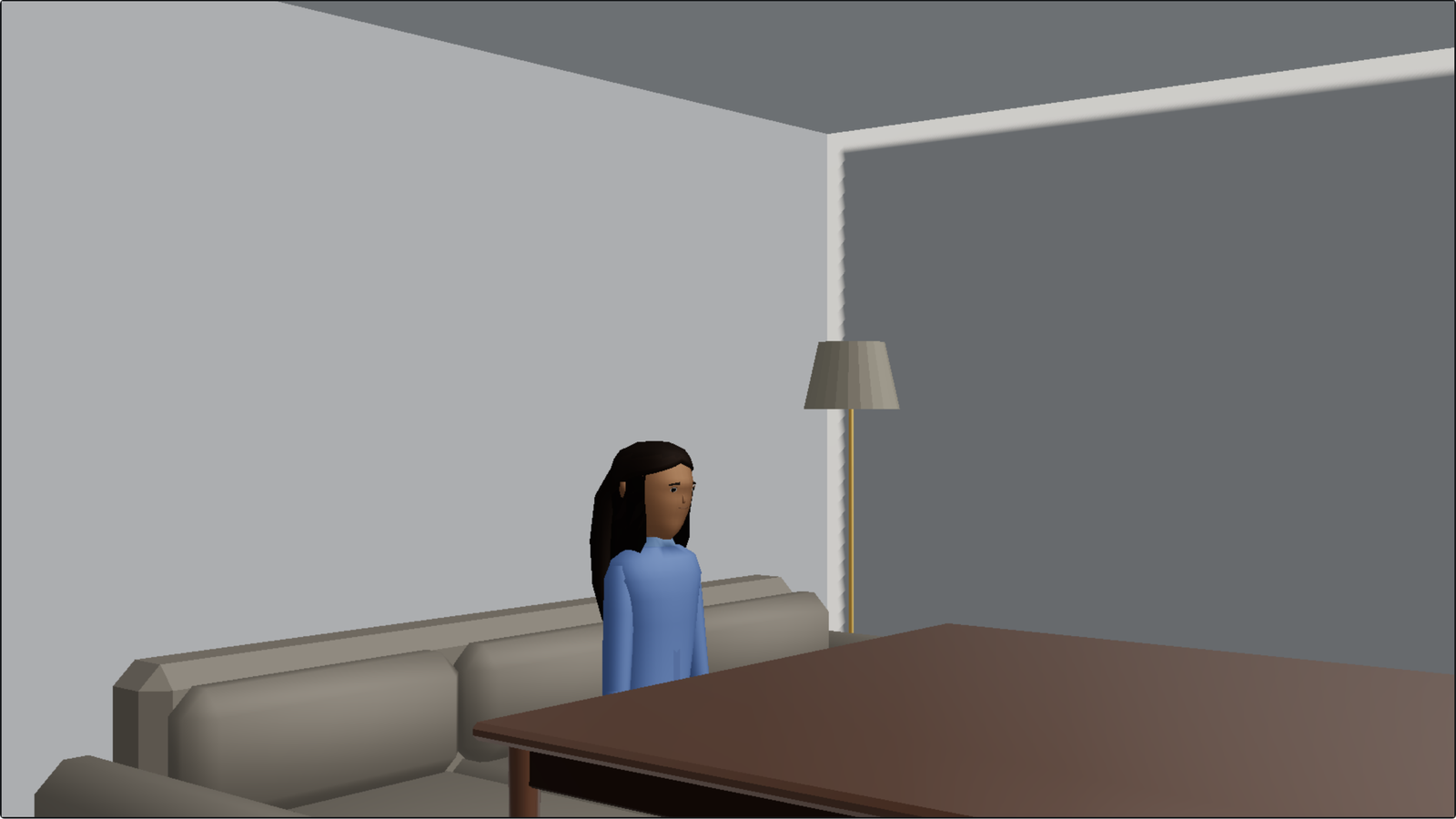 The same room through camera A on a 25mm, lit: across the table to Elena on the sofa, the floor lamp behind her.